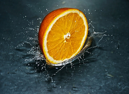 sliced orange citrus fruit on water thumbnail