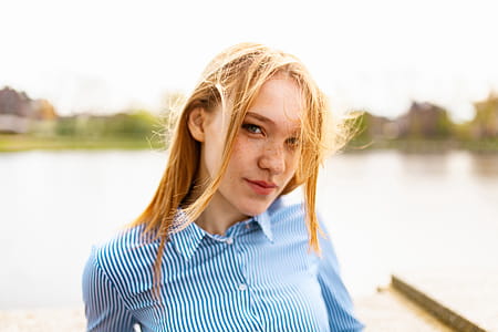 Woman in Blue and White Pinstriped Dress Shirt thumbnail