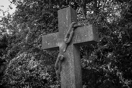 grayscale photography of cross with chain thumbnail