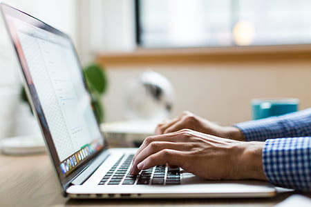 person using MacBook Pro thumbnail