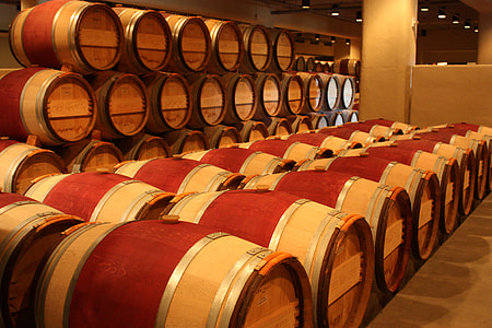 pile of red-and-beige wooden barrel lot thumbnail