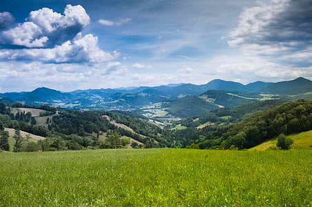 grass field near mountains thumbnail