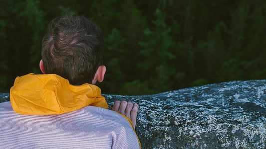 man laying on rock thumbnail