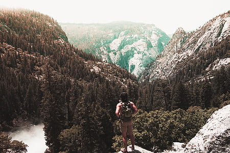 man standing on mountain thumbnail