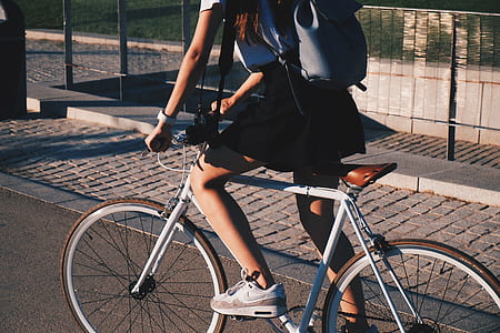 woman riding bicycle thumbnail