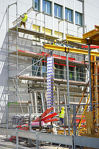 several construction workers on scaffolding thumbnail
