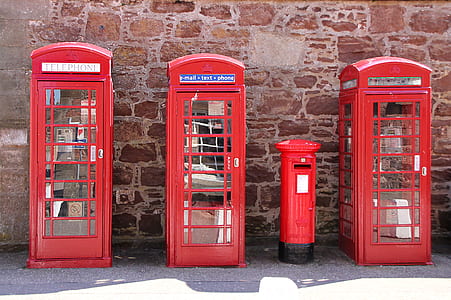 three closed red payphones thumbnail