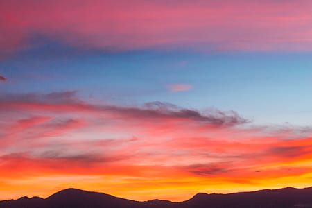 silhouette of mountain at golden hour thumbnail
