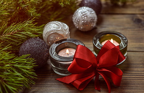 photography of two tealight candle holders on table thumbnail