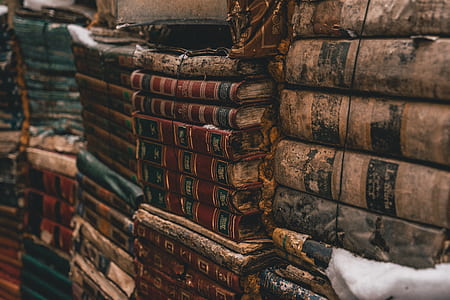 closeup photo stack of book lot thumbnail