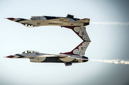 white, red, and blue aircraft thumbnail