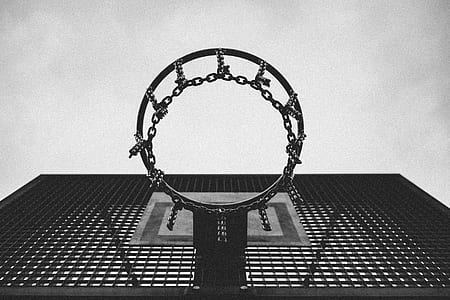 grayscale low-angle view photo of basketball ring thumbnail