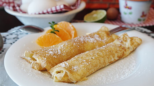 fried food on white ceramic plate near orange thumbnail