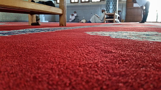 man sitting on carpet thumbnail