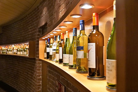assorted-brand champagne bottles thumbnail
