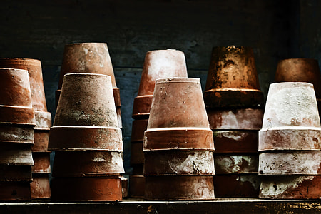 piled brown plant pots thumbnail