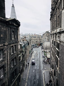 cars beside concrete structures thumbnail