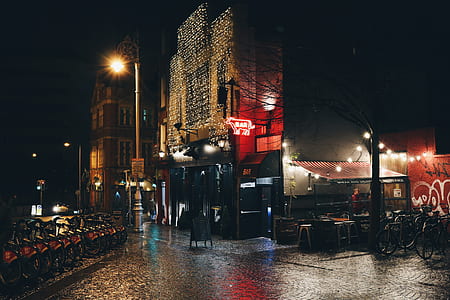 intersection road beside building during night thumbnail