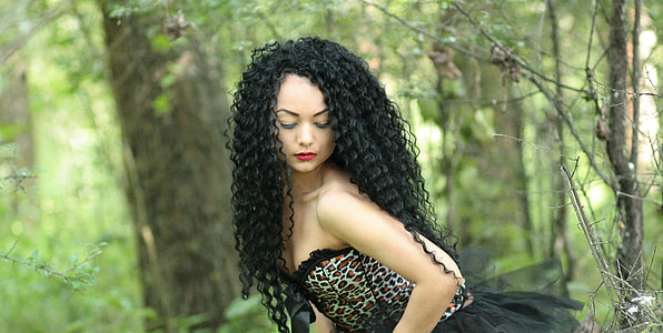 woman wearing white and black leopard print tube dress thumbnail