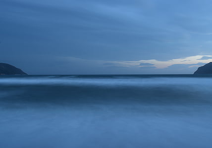 calm body of water at dusk thumbnail
