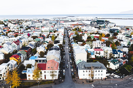 aerial photography of houses surrounded with water thumbnail