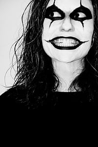 grayscale photo of person in paint mask thumbnail