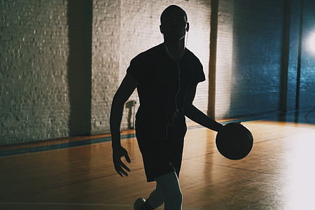 man dribbling basketball thumbnail