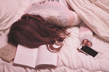 white smartphone on white cushion thumbnail