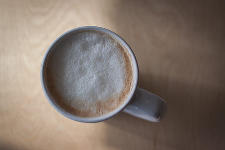 macro shot photography of white ceramic mug thumbnail