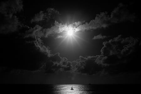 silhouette of boat on sea thumbnail