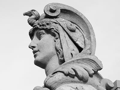 woman with bird on head statue thumbnail