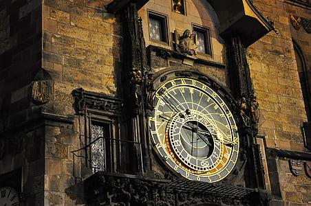 concrete building with mechanical tower clock thumbnail