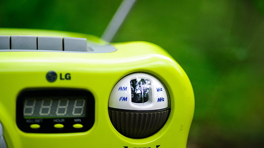 selective focus photo of green LG radio thumbnail