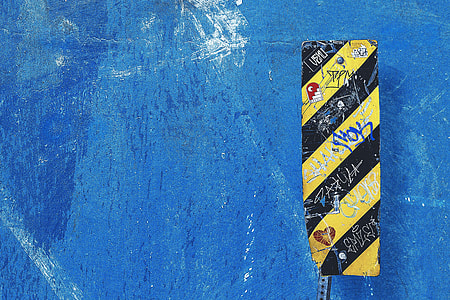 Closeup shot of a blue wall and sign thumbnail