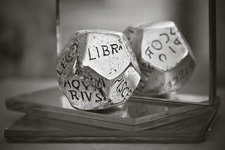 greyscale photo of silver die thumbnail