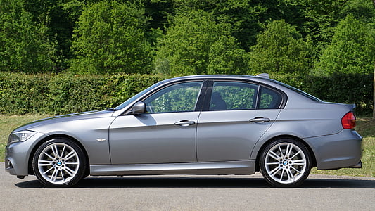 gray BMW sedan parked thumbnail