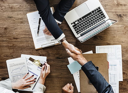 two men hand shaking photo thumbnail