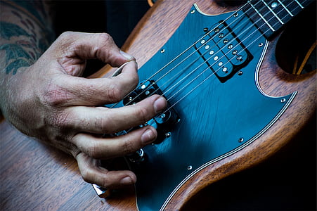 person playing guitar thumbnail