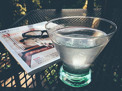 drinking glass filled with white liquid thumbnail