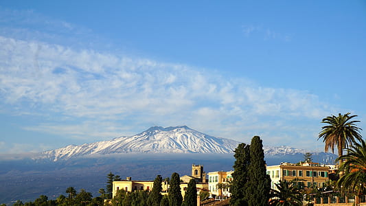 mountain and trees during daytime thumbnail