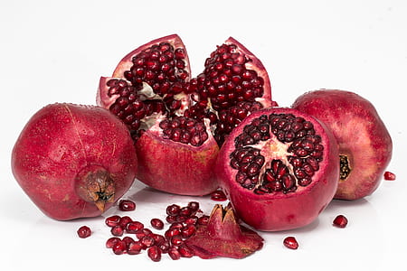 four red pomegranates thumbnail