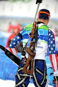 man standing with speargun hanged on his back thumbnail