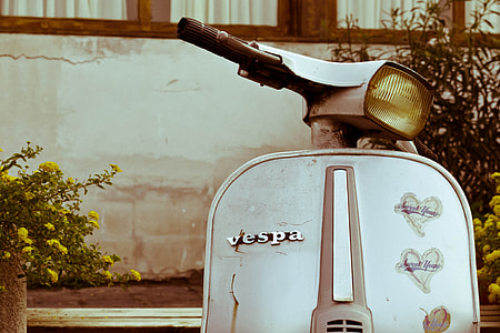 white Vespa motor scooter thumbnail
