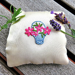 two purple lavender flowers on white and pink floral throw pillow thumbnail
