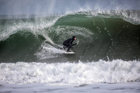 man surfing on waves thumbnail