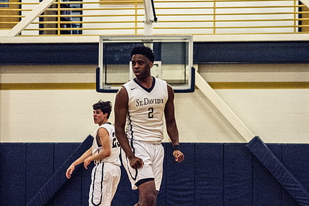 St. Davids number 2 basketball player near number 23 St. Davids basketball player on basketball court thumbnail