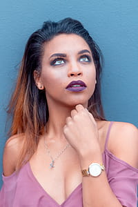 Woman Wearing Purple Cold-Shoulder Top thumbnail