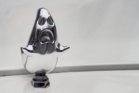 close-up photo silver ghost faucet thumbnail