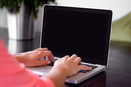person using gray laptop computer thumbnail