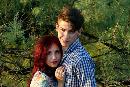 man and woman near trees thumbnail
